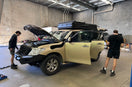 Gold Nissan Patrol Y62