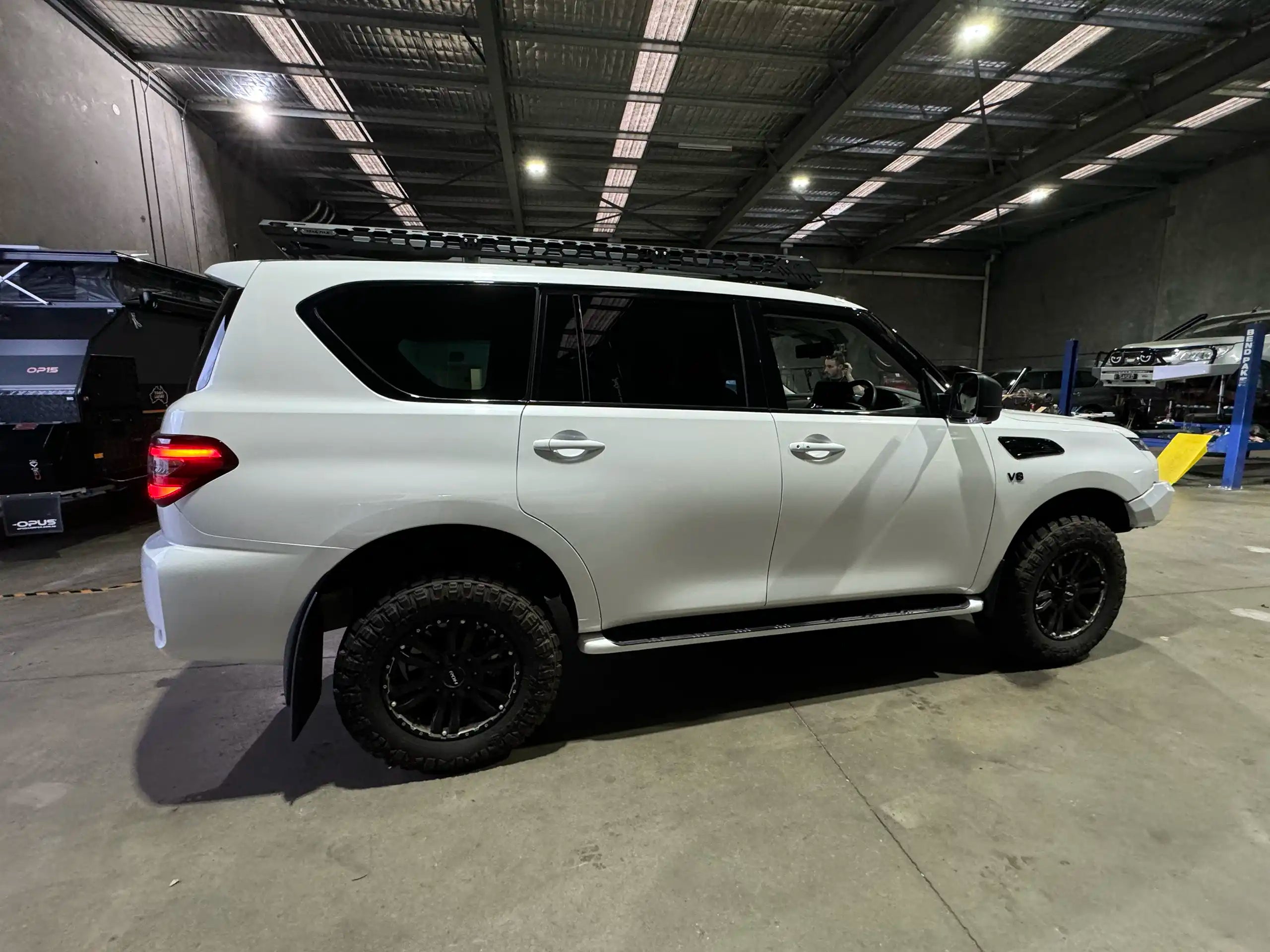 White Nissan Patrol Y62 touring rig to travel AU – Enhanced Offroad